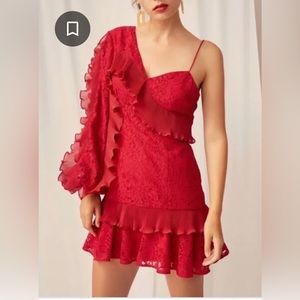 Lace and ruffle mini is the one to wear to your next party. Size L. One sleeve.